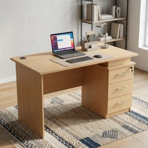 1.2M Office / Home Table featuring a rectangular wood-grain finish top, integrated circular black cable grommet, an attached three-drawer pedestal on the right side, slim metallic-toned horizontal handles, and a top drawer key lock.