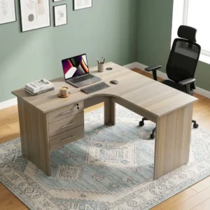 A premium 1.2M Curved Executive Desk featuring an ergonomic L-shaped corner design, a natural wood-grain laminate finish, three integrated drawers with a top lock mechanism, and built-in cable management grommets.