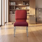 Upholstered banquet chair with padded seat, steel frame, and book storage for churches and event halls