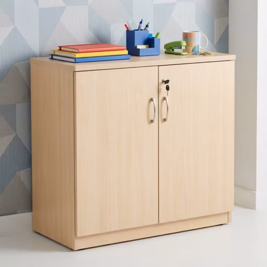 2-Door Wooden Office Cabinet placed in a modern office setup with organized files and office accessories