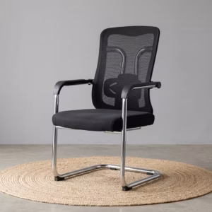 Modern black Ergonomic Mesh Guest Office Seat by TBL Furniture, featuring a breathable mesh backrest, integrated armrests, and a black steel sled base, isolated against a studio backdrop.