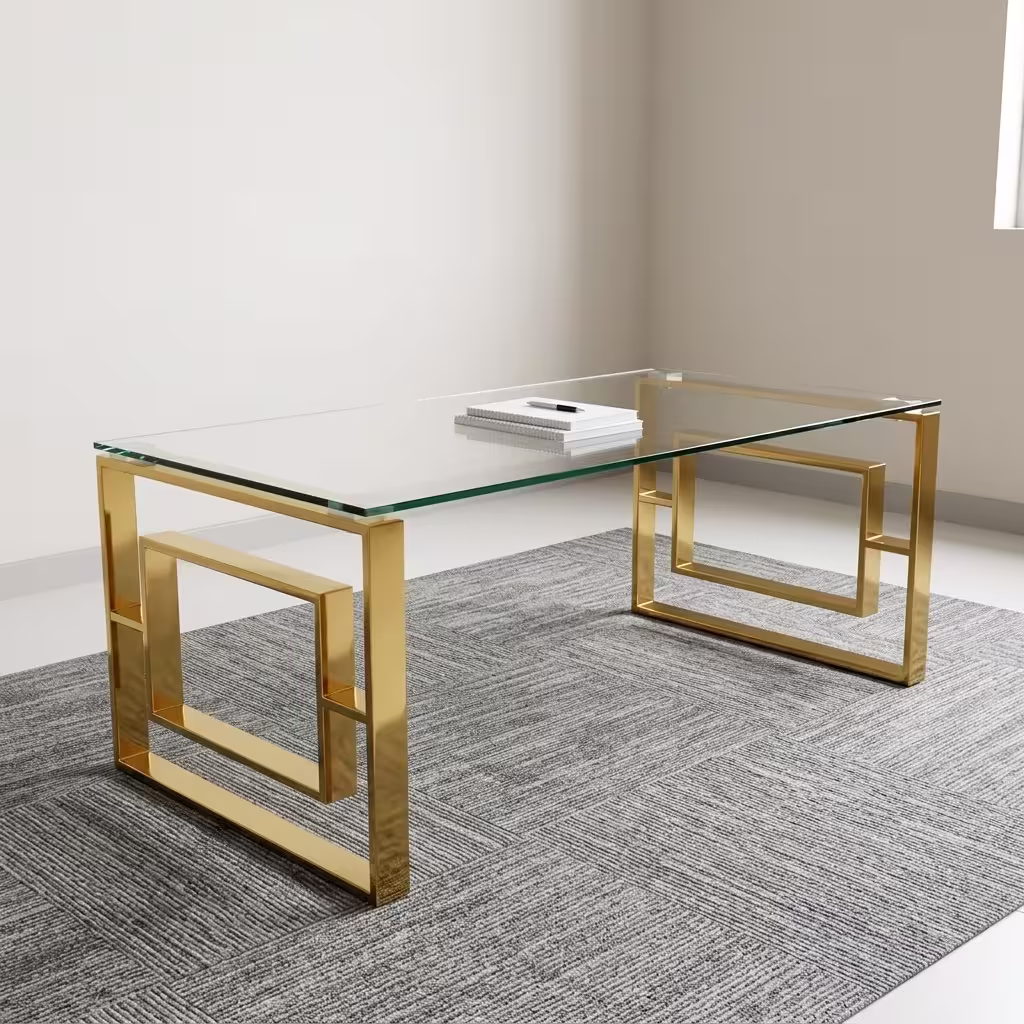 Glass Coffee Table With Goldish Frame Modern Romimex Glass Coffee Table With Goldish Frame featuring a rectangular multi-coloured glass top and a geometric gold-toned metal base on a plush cream area rug.