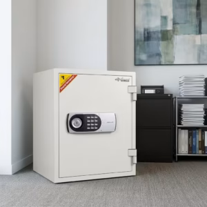 Premium Diplomat 530EK Digital Fire Safe Box in a clean off-white finish, featuring a central gray digital keypad panel with a manual key lock core, standing on a textured grey office carpet.