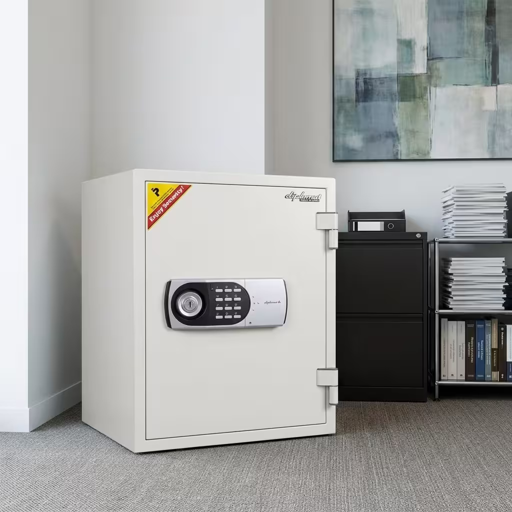 Premium Diplomat 530EK Digital Fire Safe Box in a clean off-white finish, featuring a central gray digital keypad panel with a manual key lock core, standing on a textured grey office carpet.