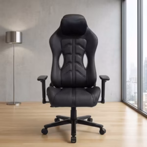 Premium High-Back Ergonomic Black Modern Gaming Chair in a sleek matte black faux leather upholstery, featuring a contoured bucket backrest, an adjustable neck headrest pillow, a matching lower lumbar cushion, rigid armrests, and a heavy-duty black five-star star base with rolling wheels, standing on a polished floor.