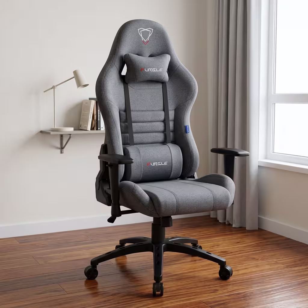 Premium Executive Fabric Gaming Chair in slate gray fabric weave upholstery, featuring an adjustable neck pillow, an oversized lower lumbar cushion, T-shaped adjustable armrests, and a heavy-duty black five-star star base with rolling wheels, standing on a light wood floor.