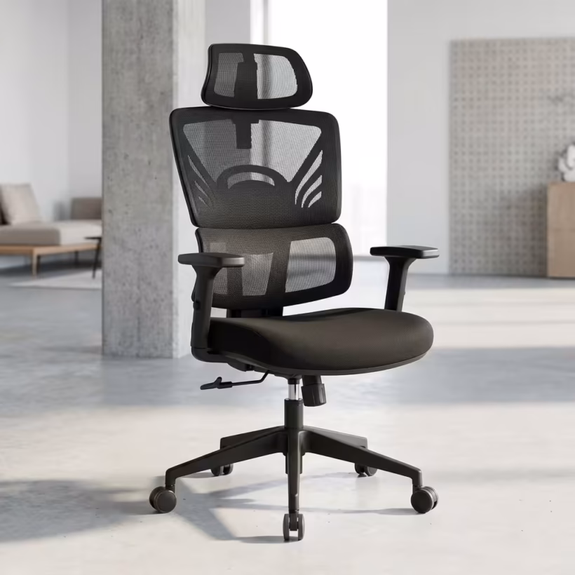 Premium High-Back Ergonomic Mesh High Back Office Chair featuring an open-airflow black mesh split backrest, matching black adjustable headrest, flat armrests, a plush black seat cushion, and a matte black five-star star base with rolling wheels, standing on a grey tile floor.