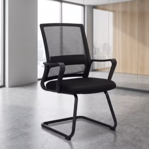 Premium Black Cantilever Office Guest Chair featuring a black mesh mid-backrest, a thick fabric upholstered seat cushion, rigid black loop armrests, and a continuous matte black steel cantilever sled frame, standing on a polished concrete floor.