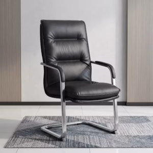 Premium High-Back Cantilever Leather Visitor Office Chair in matte black leatherette with segmented tufted padding, padded chrome loop armrests, and a reflective polished chrome continuous sled frame, standing on a textured geometric area rug.