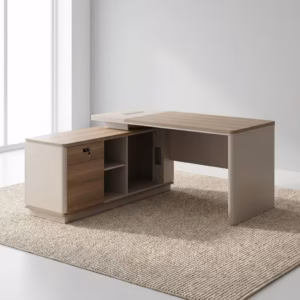 Premium 1.4M Modern L-Shaped Office Desk in a neutral beige and light wood finish, showing a dual-monitor setup and an attached side return in a sunlit corner office.