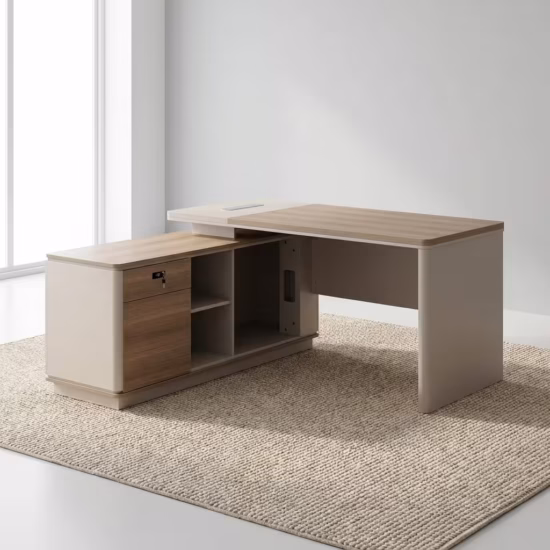 Premium 1.4M Modern L-Shaped Office Desk in a neutral beige and light wood finish, showing a dual-monitor setup and an attached side return in a sunlit corner office.