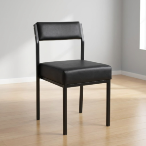 Premium Leather Padded Office Visitor Chair featuring matte black faux leather cushions and a sturdy black powder-coated metal frame, standing on a light wood floor.
