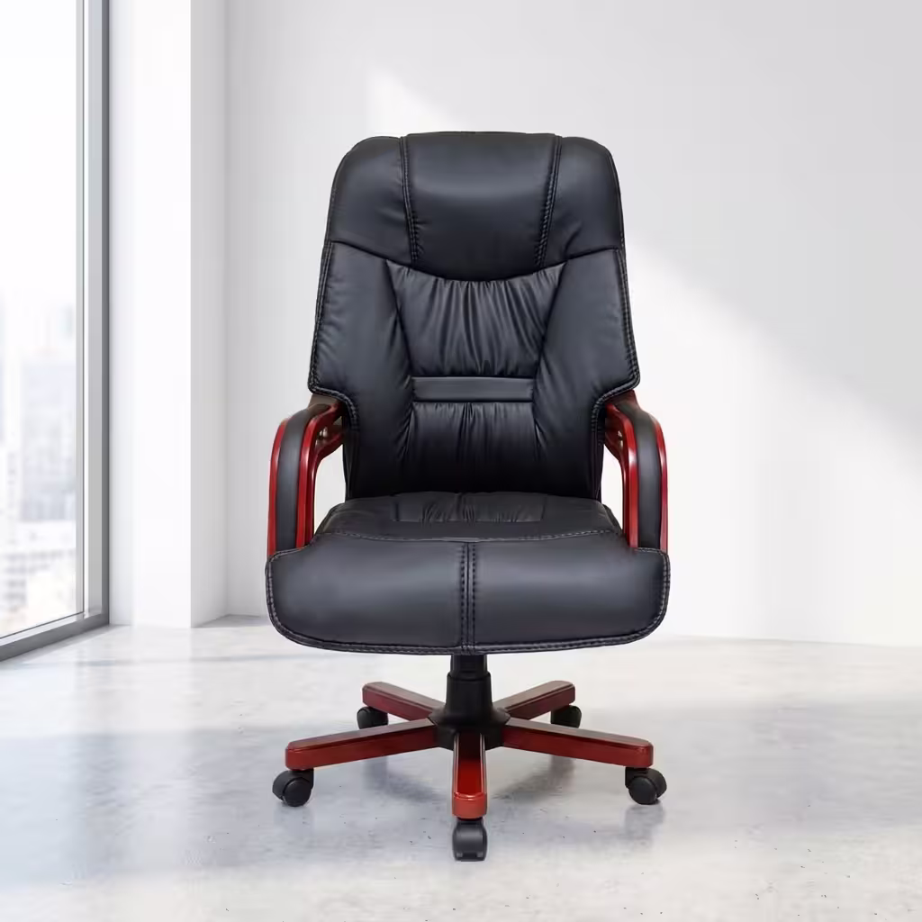 Premium High-Back Executive Director Recliner Office Chair in glossy black faux leather with thick padded armrests and a durable five-star rolling base, shown in a modern suite.