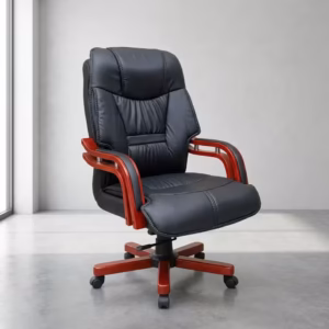 Premium High-Back Executive Director Recliner Office Chair in glossy black faux leather with thick padded armrests and a durable five-star rolling base, shown in a modern suite.