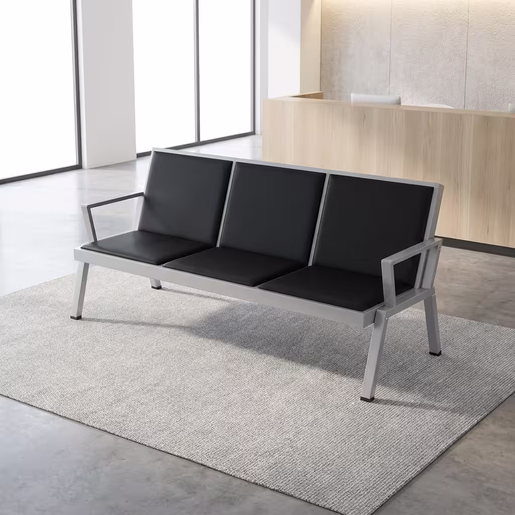 Premium 3-Link Heavy duty Reception Waiting Bench featuring three connected black cushioned seats, a silver chrome metal frame, and integrated armrests, isolated in a bright lobby.