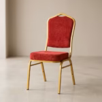 Premium Stackable Heavy-Duty Banquet Chair featuring a high-prestige crown-back silhouette in a textured fabric upholstery, supported by a glossy gold-vein powder-coated steel frame with double support braces, standing on a polished floor.