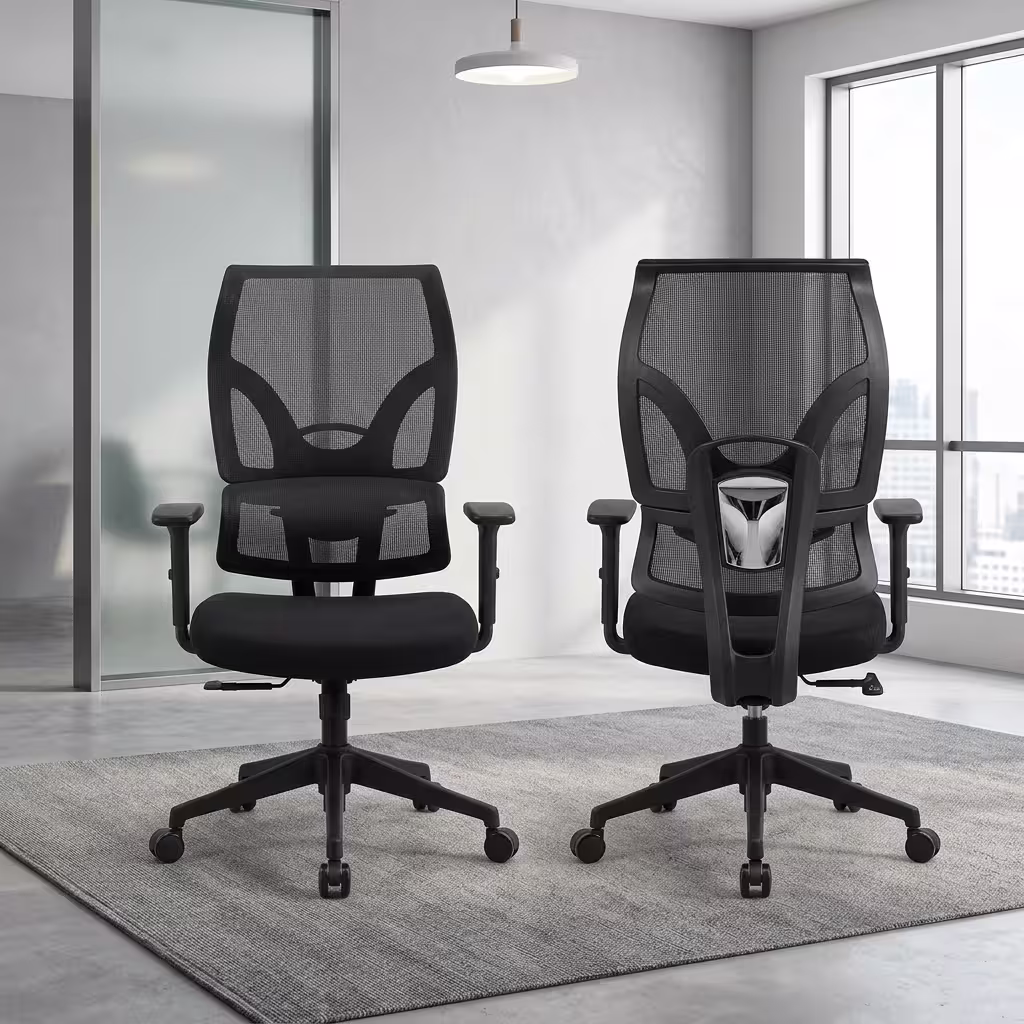 Premium Orthopedic High-Back Office Chair featuring an open-airflow black mesh backrest, integrated lumbar support section, flat T-shaped armrests, a plush black seat cushion, and a matte black five-star star base with rolling wheels, standing in a bright corporate office.