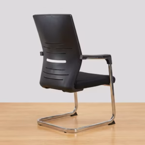 Premium Black Mesh Cantilever Visitor Chair featuring a black mesh high backrest, a thick fabric upholstered seat cushion, sleek chrome armrests with black top caps, and a reflective chrome continuous sled frame, standing on a polished concrete floor.