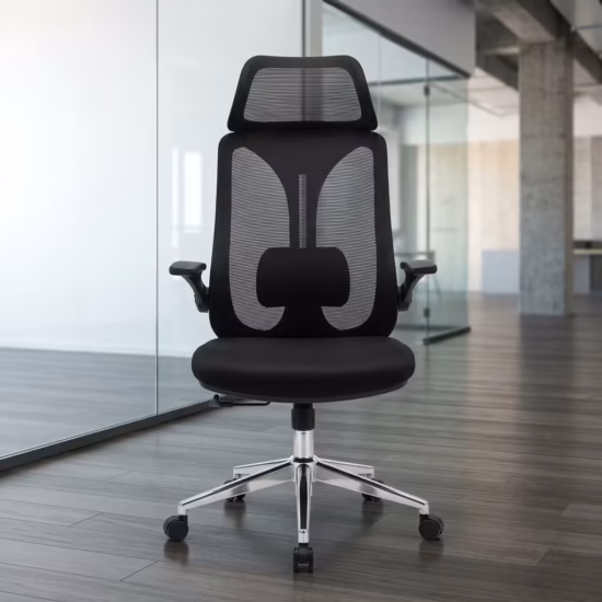 Premium High-Back Modern Ergonomic Office Swivel Chair featuring a black open-mesh backrest, integrated wide neck headrest, flip-up T-shaped armrests, a thick black fabric seat cushion, and a reflective polished chrome star base with rolling wheels, standing on a polished concrete floor.