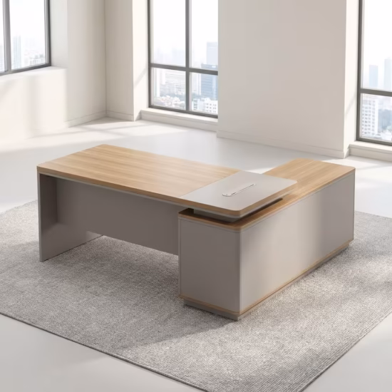 Premium 1.4M Modern L-Shaped Office Desk in a neutral beige and light wood finish, showing a dual-monitor setup and an attached side return in a sunlit corner office.