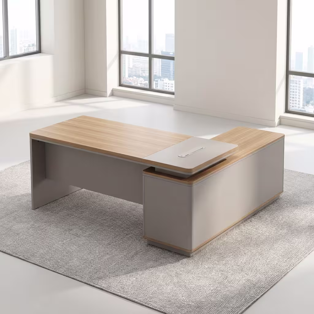 1.4M Modern L-Shaped Office Desk Premium 1.4M Modern L-Shaped Office Desk in a neutral beige and light wood finish, showing a dual-monitor setup and an attached side return in a sunlit corner office.