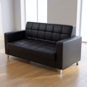 Premium 2-Seater Modern Office Reception Sofa upholstered in grid-tufted black leather with polished chrome legs, standing on a smooth concrete floor in a modern lobby.