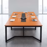 Premium 2400MM Modern Conference Table featuring a thick rustic brown woodgrain top and a bold black steel frame, surrounded by modern office chairs.