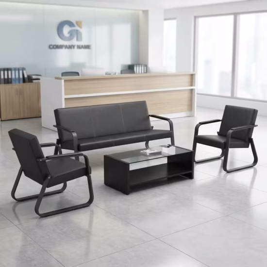 Premium 5-Seater Reception Office Sofa Set in smooth matte black faux leather, featuring thick tufted cushions, structural padded armrests with vertical silver accent trim lines, placed in a modern corporate lobby.