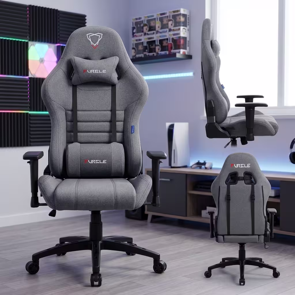 Premium Executive Fabric Gaming Chair in slate gray fabric weave upholstery, featuring an adjustable neck pillow, an oversized lower lumbar cushion, T-shaped adjustable armrests, and a heavy-duty black five-star star base with rolling wheels, standing on a light wood floor.