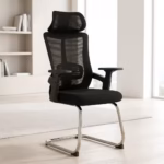 Premium High Back Orthopedic Visitor Chair featuring a black mesh high backrest with an integrated headrest, black sculpted armrests, and a reflective polished chrome sled base on a light grey floor.