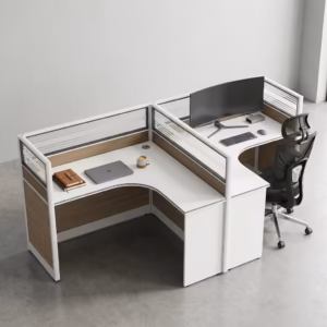 Premium 2-Way Curved Office Workstation showcasing an elevated perspective of a back-to-back dual user layout, featuring curved L-shaped white tables with natural woodgrain side panels, integrated translucent slatted glass privacy partition screens, and active workspaces with a curved monitor, laptop, and a black mesh ergonomic task chair on a smooth grey concrete floor.
