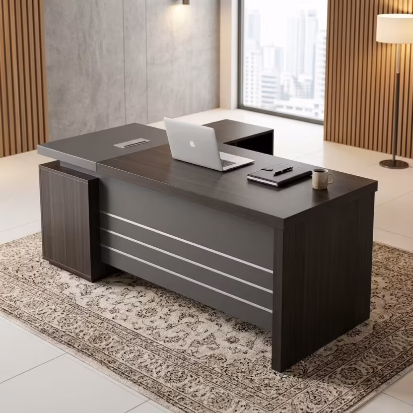 Premium 1.6M Dark Oak Executive Office Desk in a rich dark oak woodgrain finish with a matte charcoal grey front modesty panel and an integrated side return storage cabinet, displaying a sleek laptop.