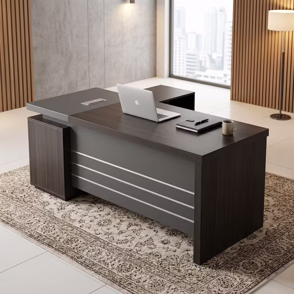 Premium 1.6M Dark Oak Executive Office Desk in a rich dark oak woodgrain finish with a matte charcoal grey front modesty panel and an integrated side return storage cabinet, displaying a sleek laptop.