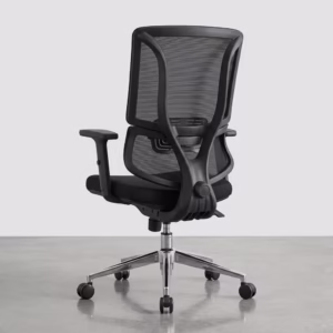 Premium mid-back Office Chair With Lumbar Support featuring a black open-mesh backrest, adjustable T-shaped armrests, a thick fabric seat cushion, and a reflective polished chrome star base with rolling wheels, standing on a polished concrete floor.