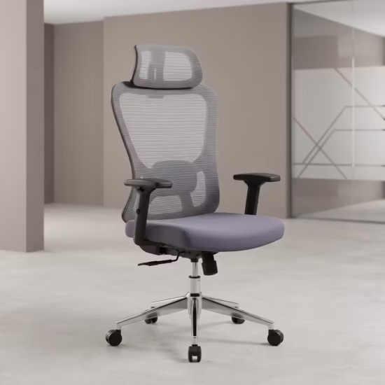 Premium High-Back Grey Mesh Ergonomic Office Chair featuring an open-airflow grey mesh backrest, matching adjustable headrest, flat black T-shaped armrests, a plush grey seat cushion, and a highly reflective polished chrome five-star star base with rolling wheels, standing on a light grey concrete floor.