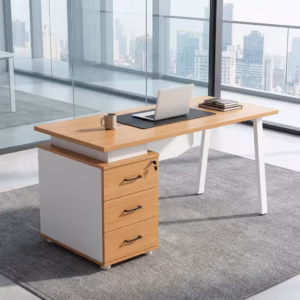 Premium 1.4M Executive Desk With 3-Drawer Storage in a dark walnut woodgrain finish, showcasing a flat rectangular tabletop supporting an open laptop, a pen holder set, and stacked books, with an integrated side storage pedestal showing a key lock and silver bar handles, standing on a polished concrete floor.