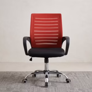 Premium Secretarial Mid Back Office Chair featuring a vibrant red mesh mid-backrest with horizontal structural lines, curved black armrests, a plush black fabric seat cushion, and a highly reflective polished chrome five-star base with rolling caster wheels, standing on a textured grey area rug.