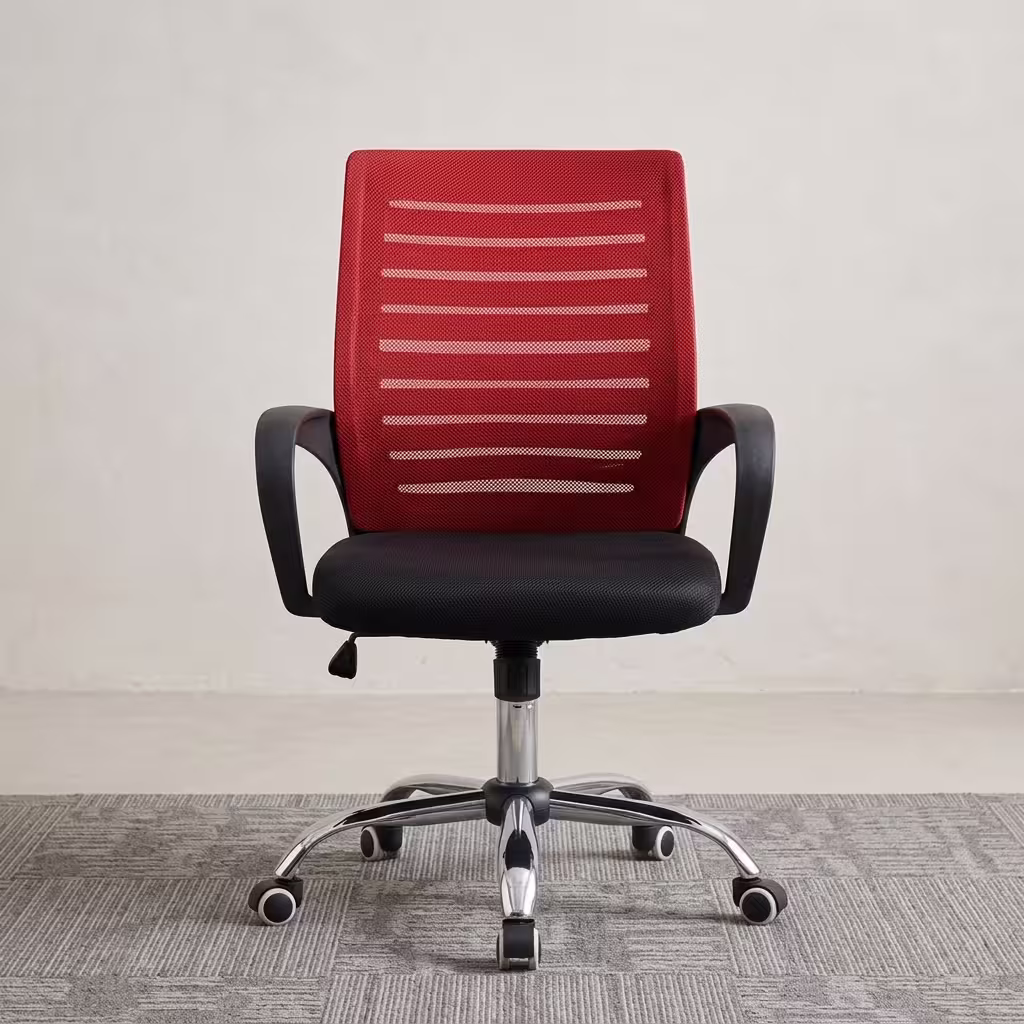 Premium Secretarial Mid Back Office Chair featuring a vibrant red mesh mid-backrest with horizontal structural lines, curved black armrests, a plush black fabric seat cushion, and a highly reflective polished chrome five-star base with rolling caster wheels, standing on a textured grey area rug.