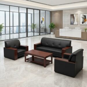 Premium Executive 5-Seater Office Sofa Set featuring a 3-seater sofa and two single-seater armchairs upholstered in button-tufted black leatherette with thick mahogany wood block armrests, arranged around a matching rectangular wooden two-tier coffee table on a large woven beige rug inside a modern corporate office lobby.