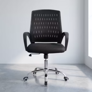 Premium Mid-Back Secretarial Office Chair in a sleek black finish, showcasing a breathable mesh mid-backrest with vertical dashed patterns, curved black loop armrests, a thick textured seat cushion, and a highly reflective polished chrome five-star base with rolling caster wheels, standing on a smooth polished concrete floor.