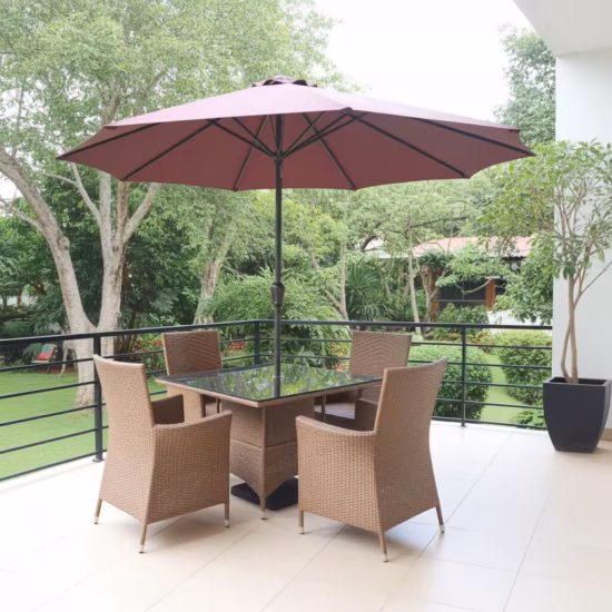 Buy the heavy-duty 4-Seater Outdoor Set With Patio Umbrella. Features four hand-woven tan synthetic wicker armchairs, a square black glass dining table, and a crimson red crank-lift sun umbrella.
