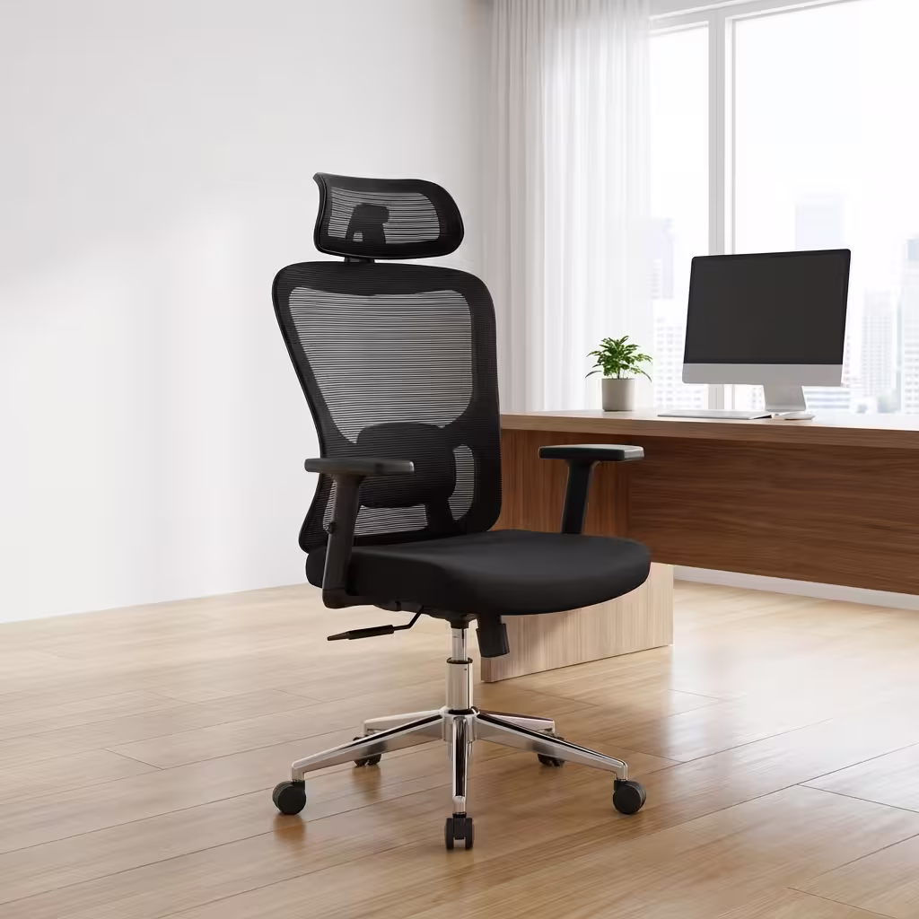 Premium High-Back Ergonomic Office Chair With Lumbar Support featuring a black mesh backrest, a matching rectangular adjustable headrest, built-in horizontal lumbar cushion support, flat T-shaped armrests, a plush black seat cushion, and a highly reflective polished chrome five-star base with rolling wheels, standing on a polished light wood floor.