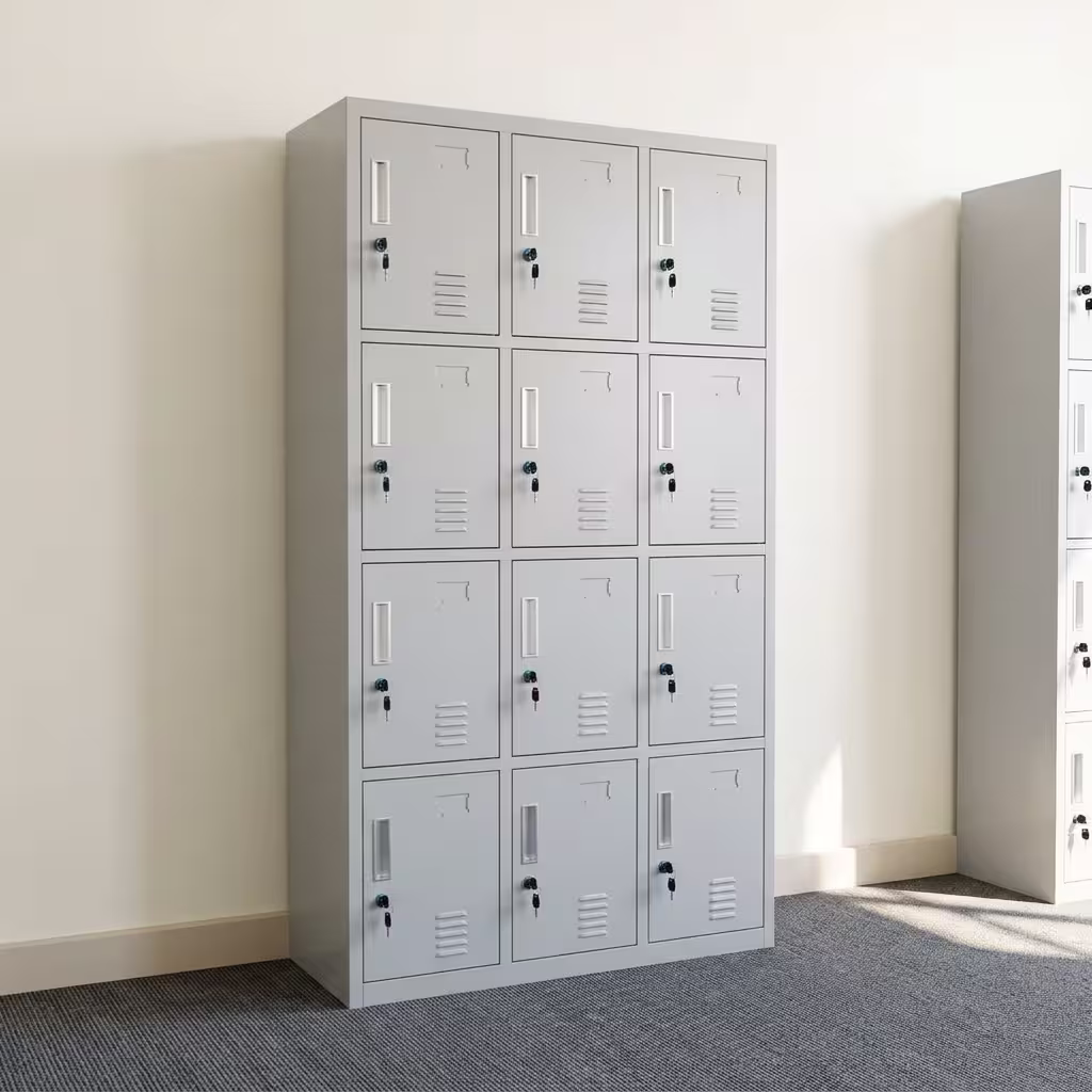 12-Locker Filing Steel Locker Cabinet Premium 12-Locker Filing Steel Locker Cabinet in a professional light grey powder-coated steel finish, showcasing a 3x4 grid layout of twelve closed locker doors with recessed handles, cylinder locks with keys inserted, name card frames, and stamped bottom ventilation slits, standing flat on smooth light wood flooring against a textured grey background.