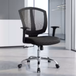 Premium Mid-Back Adjustable Office Chair featuring an open-airflow black mesh backrest with a vertical center-split design frame, a thick contoured black fabric seat cushion, T-shaped black armrests, a manual height adjustment lever, and a highly reflective polished chrome five-star star base with rolling wheels, standing on a polished concrete floor.