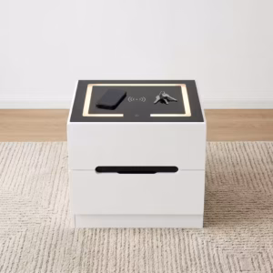 Modern white Bedside Table With Lighting featuring an integrated wireless charging top panel, warm LED border glow, and a minimalist handle less drawer design on a beige rug.