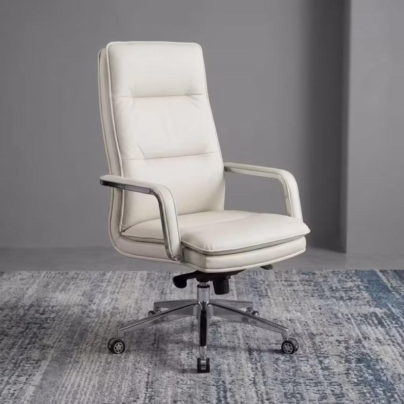 Oxy Cream executive Office Chair featuring a high-back cream leather design, sleek chrome armrests, and a 5-star rolling caster base on a blue patterned rug.