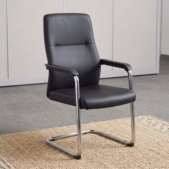 Executive Leather visitor chair in black color featuring a chrome cantilever base and padded armrests, displayed on a textured grey rug.