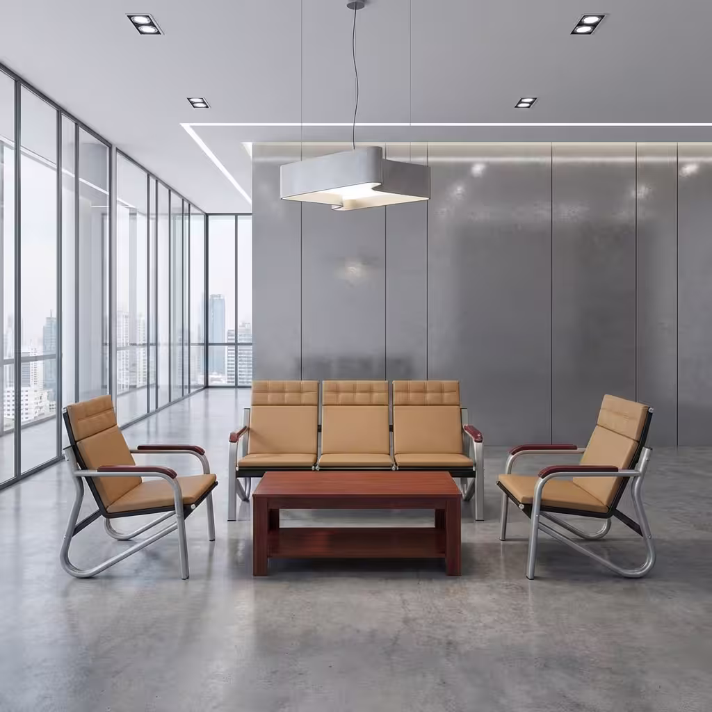 Premium Executive 5-Seater Reception Sofa Set featuring a 3-seater tandem sofa and two single-seater armchairs upholstered in tan segmented leatherette with chrome cantilever frames and dark wood armrests, arranged around a matching rectangular wooden two-tier coffee table on a polished concrete floor inside a modern corporate office lobby.