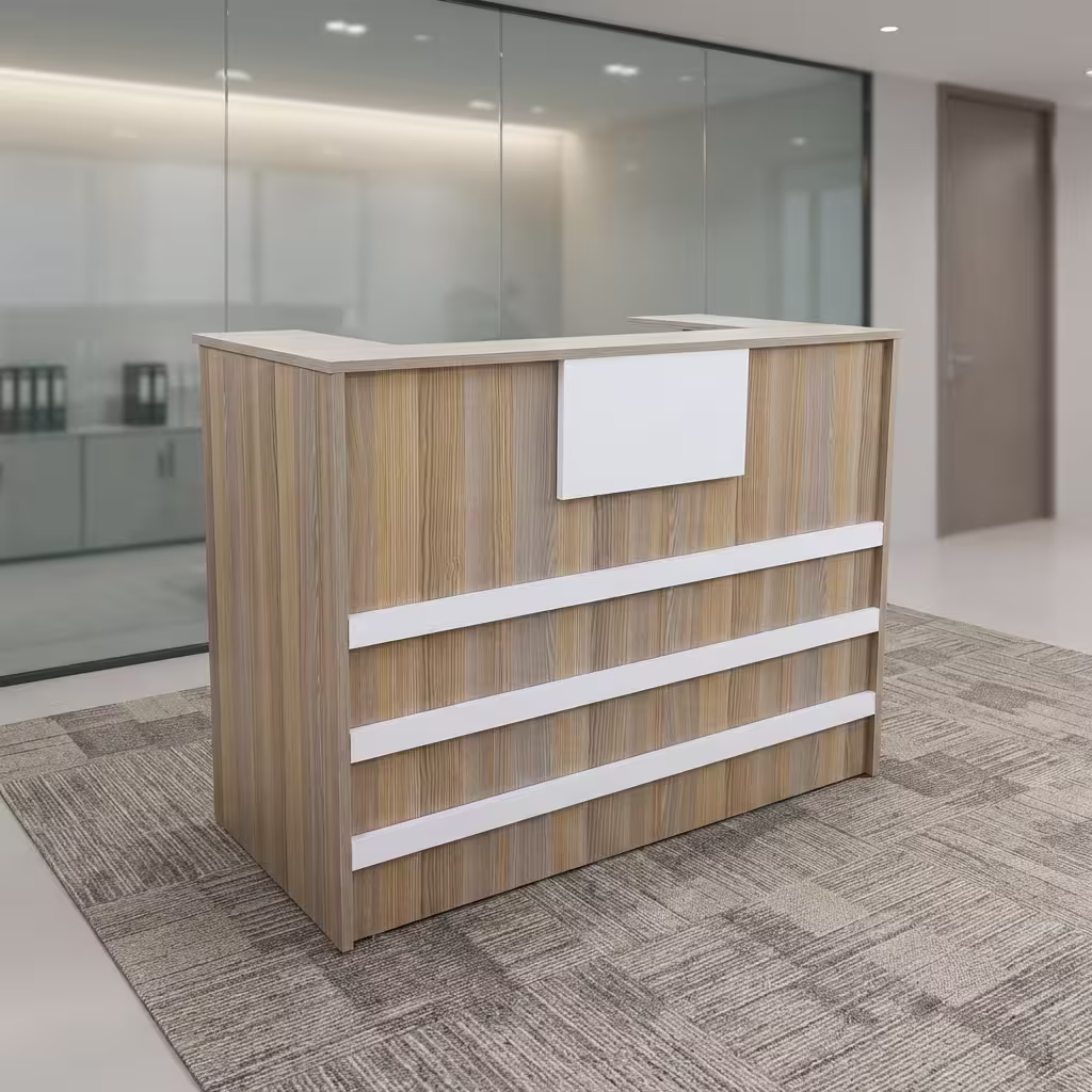A compact Wooden 1200mm Office Reception Desk featuring vertical light brown wood grain panels accented with three horizontal white stripes and a top white display panel, resting on a beige rug in a bright lobby.