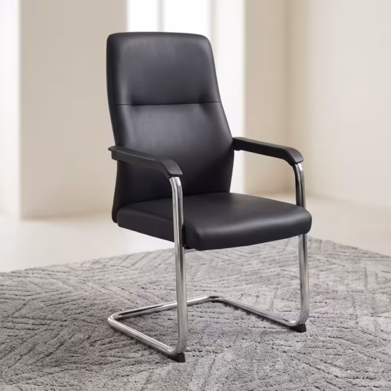 Executive Leather visitor chair in black color featuring a chrome cantilever base and padded armrests, displayed on a textured grey rug.